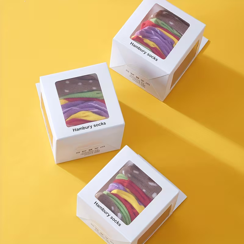 Geschenksocken in einer Hamburgerbox