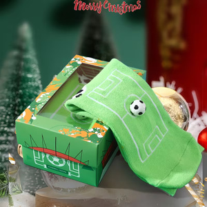 Grüne Herrensocken mit Fußballmuster